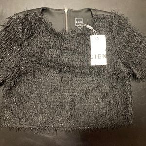 Black fashion top with details in front and zipper in the back (new).